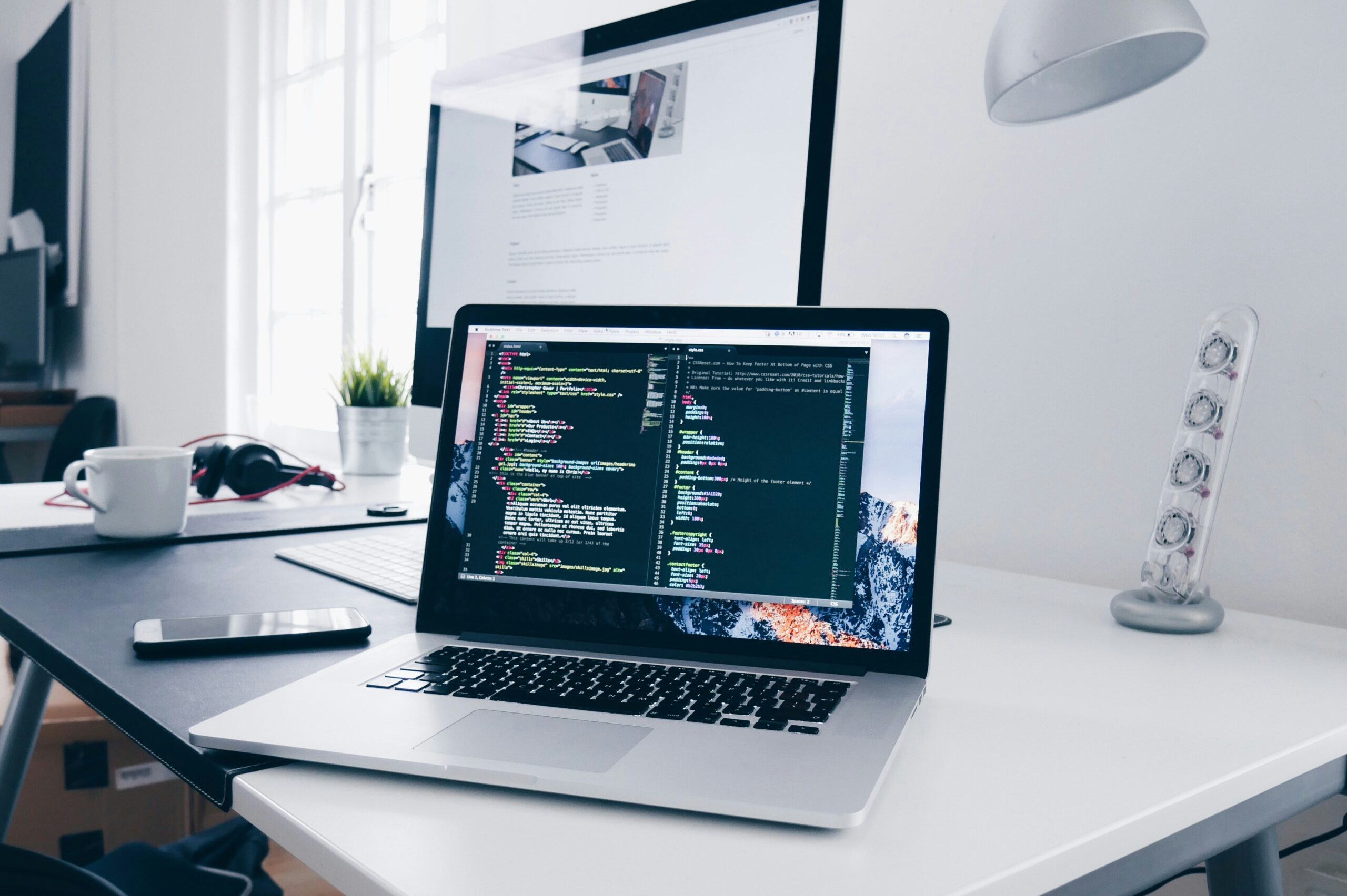 coding snippets on a laptop screen